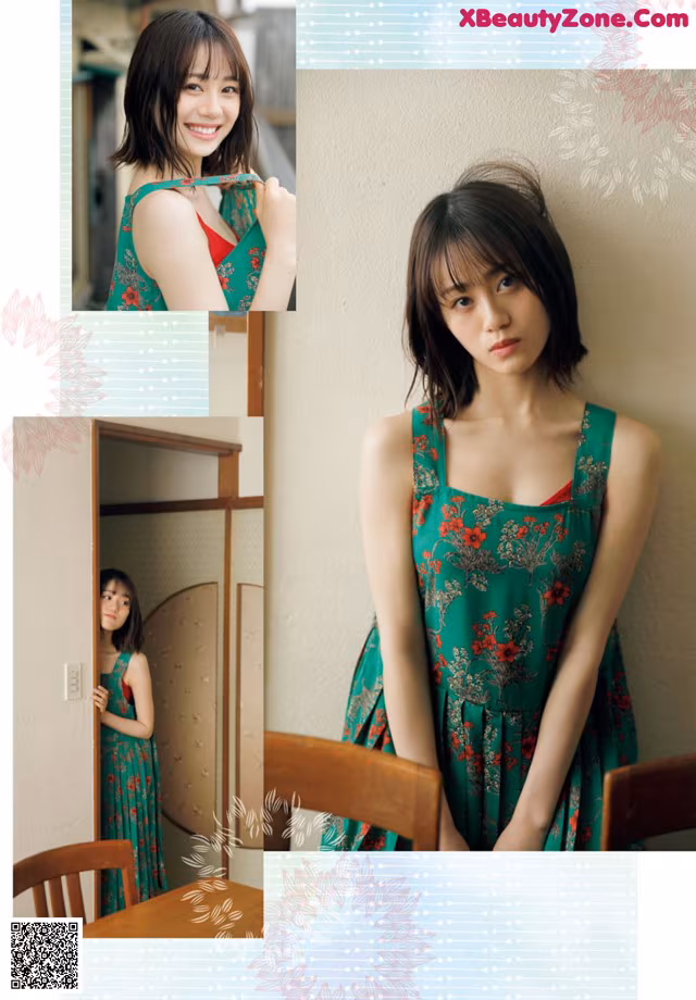 A woman in a green dress posing for a picture.